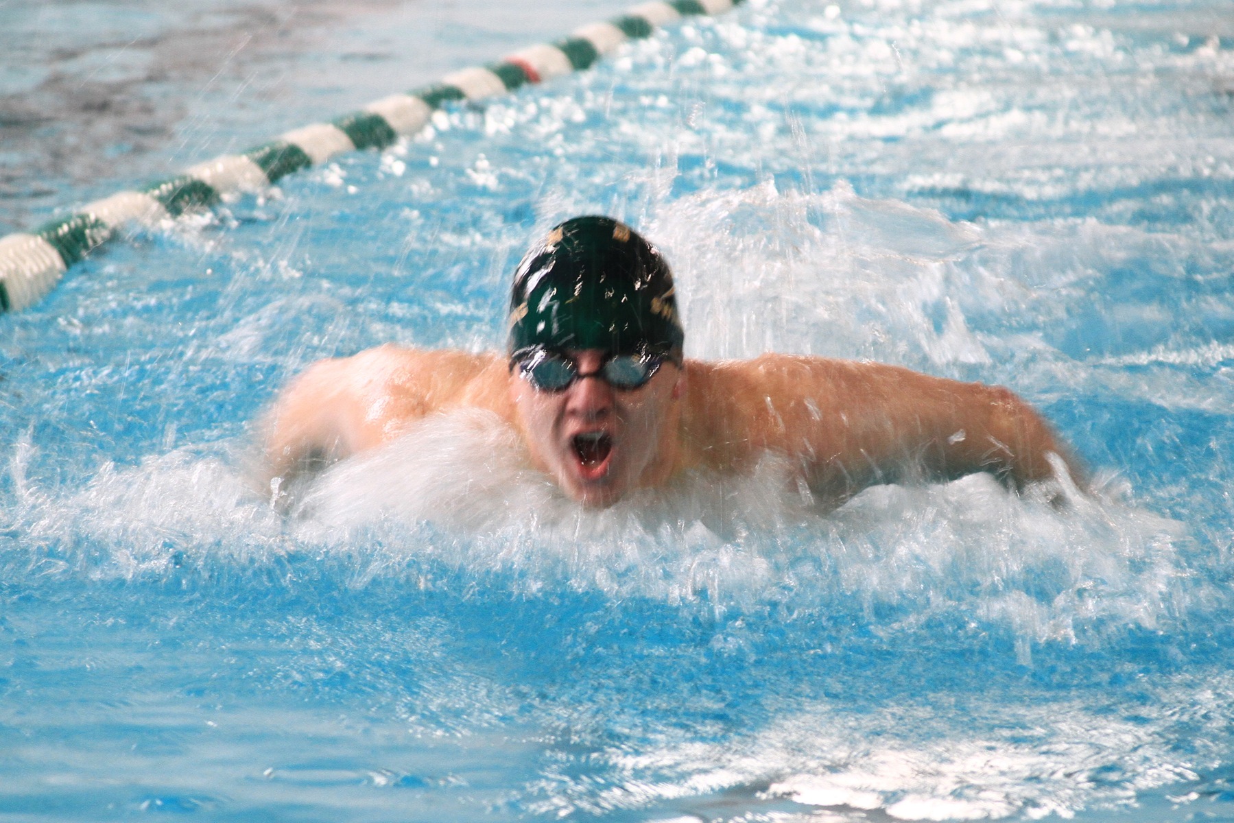 Swimming Opens Up Home Schedule with Two Wins