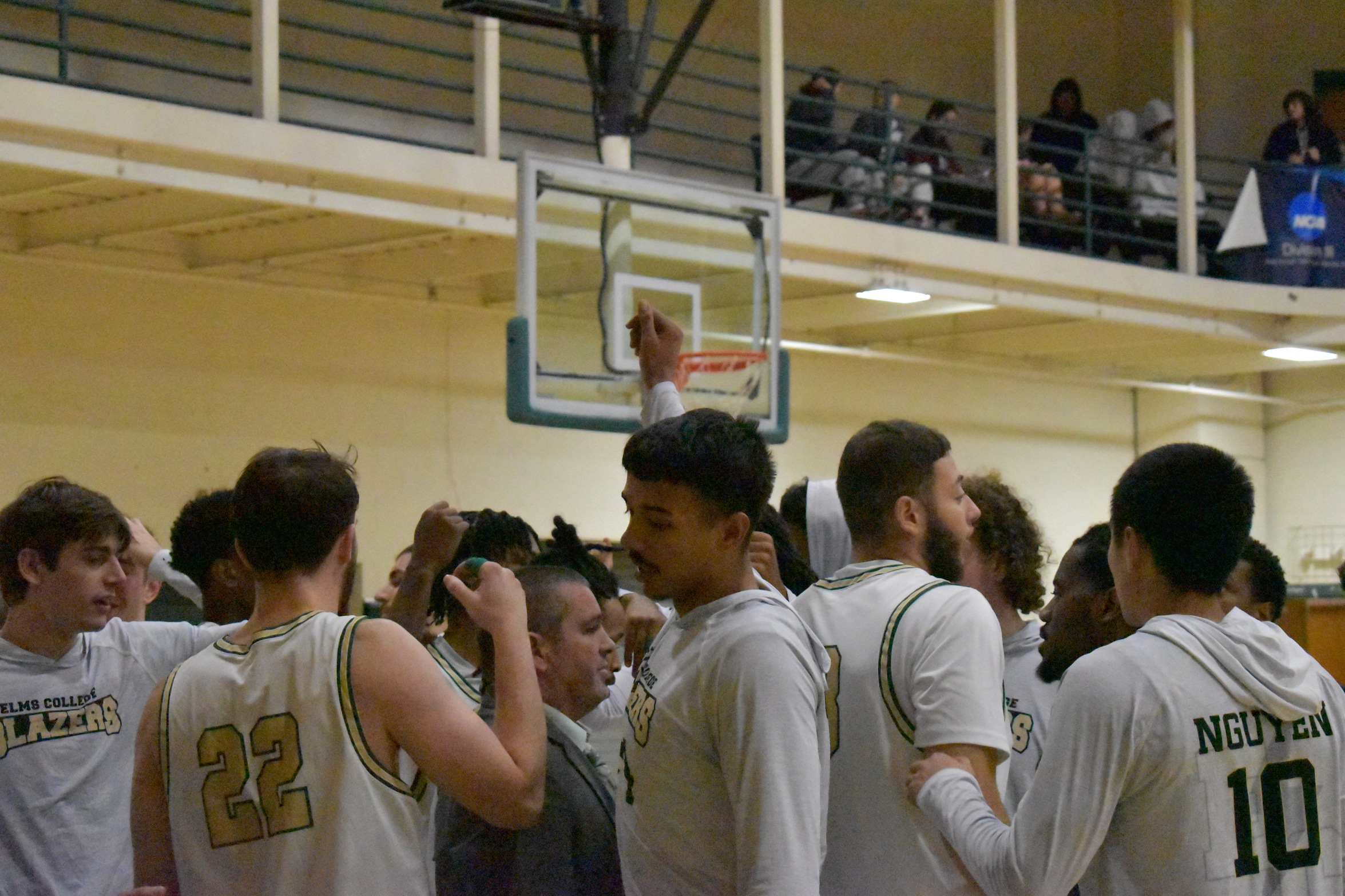 Men's Basketball Defeated by Saints