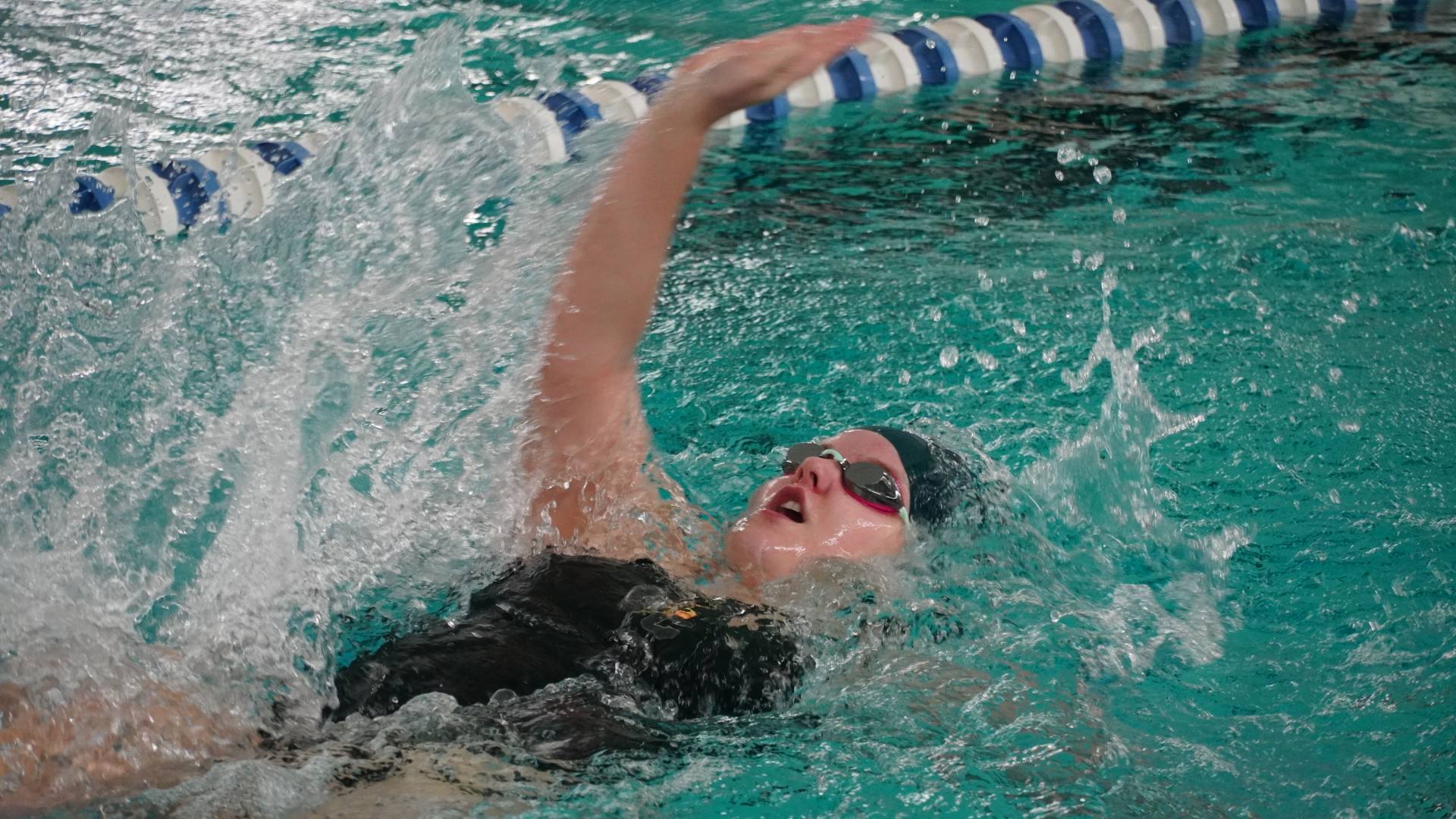 Swimming Loses a Close Battle to Rhode Island College